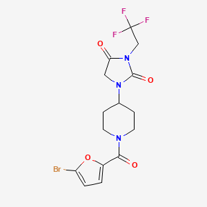 molecular formula C15H15BrF3N3O4 B2598594 1-[1-(5-Bromofuran-2-carbonyl)piperidin-4-yl]-3-(2,2,2-trifluoroethyl)imidazolidine-2,4-dione CAS No. 2097867-19-9