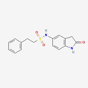 molecular formula C16H16N2O3S B2598698 N-(2-oxoindolin-5-yl)-2-phenylethanesulfonamide CAS No. 921812-25-1