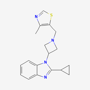 molecular formula C18H20N4S B2599103 5-[[3-(2-Cyclopropylbenzimidazol-1-yl)azetidin-1-yl]methyl]-4-methyl-1,3-thiazole CAS No. 2380084-43-3