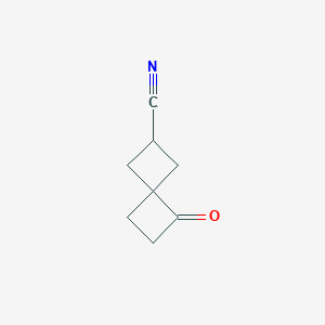 molecular formula C8H9NO B2599494 7-Oxospiro[3.3]heptane-2-carbonitrile CAS No. 2413904-81-9