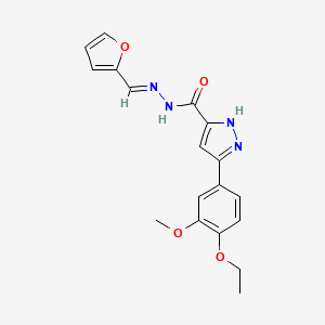 molecular formula C18H18N4O4 B2600021 3-(4-ethoxy-3-methoxyphenyl)-N'-[(E)-furan-2-ylmethylidene]-1H-pyrazole-5-carbohydrazide CAS No. 1285603-88-4
