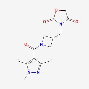 molecular formula C14H18N4O4 B2600318 3-((1-(1,3,5-trimethyl-1H-pyrazole-4-carbonyl)azetidin-3-yl)methyl)oxazolidine-2,4-dione CAS No. 2034524-06-4