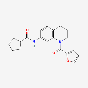 molecular formula C20H22N2O3 B2600543 N-[1-(2-furoyl)-1,2,3,4-tetrahydroquinolin-7-yl]cyclopentanecarboxamide CAS No. 1005300-89-9