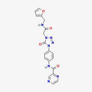 molecular formula C19H16N8O4 B2600586 N-(4-(4-(2-((furan-2-ylmethyl)amino)-2-oxoethyl)-5-oxo-4,5-dihydro-1H-tetrazol-1-yl)phenyl)pyrazine-2-carboxamide CAS No. 1396877-27-2