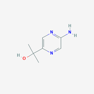 B2601102 2-(5-Aminopyrazin-2-yl)propan-2-ol CAS No. 1174231-20-9