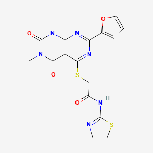 molecular formula C17H14N6O4S2 B2601139 2-((2-(furan-2-yl)-6,8-dimethyl-5,7-dioxo-5,6,7,8-tetrahydropyrimido[4,5-d]pyrimidin-4-yl)thio)-N-(thiazol-2-yl)acetamide CAS No. 863003-70-7