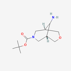 molecular formula C12H22N2O3 B2601860 (1R,5S,9s)-叔丁基 9-氨基-3-氧杂-7-氮杂双环[3.3.1]壬烷-7-羧酸盐 CAS No. 1932441-42-3