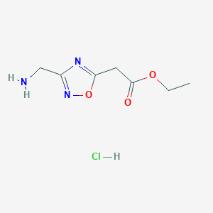 molecular formula C7H12ClN3O3 B2602659 Ethyl 2-[3-(aminomethyl)-1,2,4-oxadiazol-5-yl]acetate;hydrochloride CAS No. 2378501-66-5