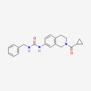 molecular formula C21H23N3O2 B2602721 1-Benzyl-3-(2-(cyclopropanecarbonyl)-1,2,3,4-tetrahydroisoquinolin-7-yl)urea CAS No. 1211404-02-2