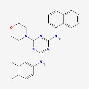 molecular formula C25H26N6O B2603334 N2-(3,4-dimethylphenyl)-6-(morpholin-4-yl)-N4-(naphthalen-1-yl)-1,3,5-triazine-2,4-diamine CAS No. 946339-44-2