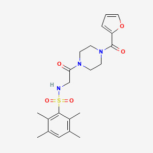 molecular formula C21H27N3O5S B2603414 N-(2-(4-(furan-2-carbonyl)piperazin-1-yl)-2-oxoethyl)-2,3,5,6-tetramethylbenzenesulfonamide CAS No. 690246-15-2