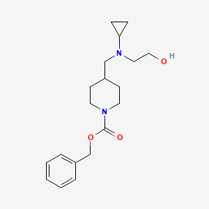 molecular formula C19H28N2O3 B2603525 4-{[Cyclopropyl-(2-hydroxy-ethyl)-amino]-methyl}-piperidine-1-carboxylic acid benzyl ester CAS No. 1353947-86-0