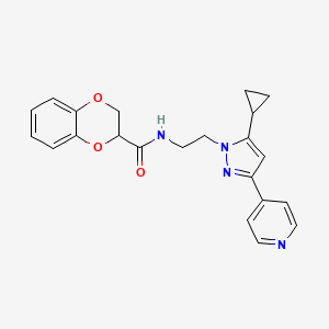 molecular formula C22H22N4O3 B2603590 N-(2-(5-cyclopropyl-3-(pyridin-4-yl)-1H-pyrazol-1-yl)ethyl)-2,3-dihydrobenzo[b][1,4]dioxine-2-carboxamide CAS No. 1797259-86-9