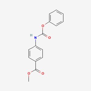 molecular formula C15H13NO4 B2603997 Methyl 4-[(phenoxycarbonyl)amino]benzoate CAS No. 101097-65-8