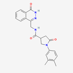 molecular formula C22H22N4O3 B2604066 1-(3,4-dimethylphenyl)-5-oxo-N-((4-oxo-3,4-dihydrophthalazin-1-yl)methyl)pyrrolidine-3-carboxamide CAS No. 899985-14-9