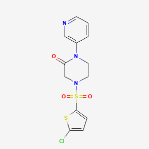 4-[(5-Chlorothiophen-2-yl)sulfonyl]-1-(pyridin-3-yl)piperazin-2-one