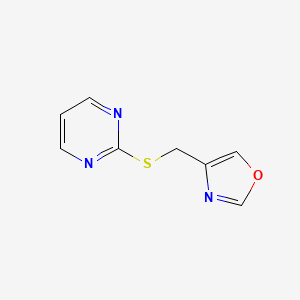 molecular formula C8H7N3OS B2604267 4-((嘧啶-2-硫基)甲基)恶唑 CAS No. 2320896-09-9
