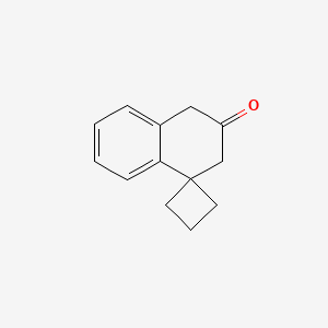 molecular formula C13H14O B2604372 Spiro[1,3-dihydronaphthalene-4,1'-cyclobutane]-2-one CAS No. 2445793-95-1