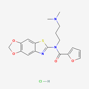 molecular formula C18H20ClN3O4S B2604496 N-([1,3]dioxolo[4',5':4,5]benzo[1,2-d]thiazol-6-yl)-N-(3-(dimethylamino)propyl)furan-2-carboxamide hydrochloride CAS No. 1177857-54-3