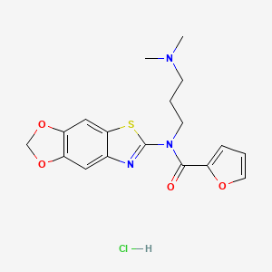 molecular formula C18H20ClN3O4S B2604496 N-([1,3]二氧杂环[4',5':4,5]苯并[1,2-d]噻唑-6-基)-N-(3-(二甲氨基)丙基)呋喃-2-甲酰胺盐酸盐 CAS No. 1177857-54-3