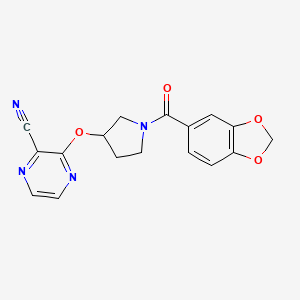 molecular formula C17H14N4O4 B2604498 3-((1-(Benzo[d][1,3]dioxole-5-carbonyl)pyrrolidin-3-yl)oxy)pyrazine-2-carbonitrile CAS No. 2034476-00-9