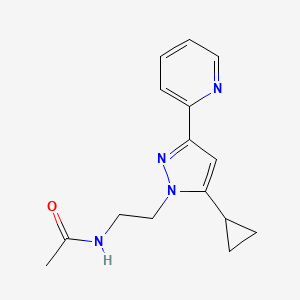 molecular formula C15H18N4O B2605558 N-(2-(5-cyclopropyl-3-(pyridin-2-yl)-1H-pyrazol-1-yl)ethyl)acetamide CAS No. 1797674-03-3