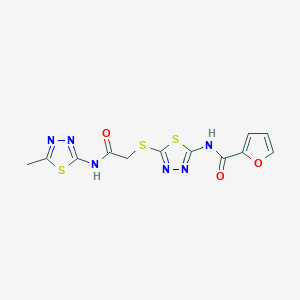 molecular formula C12H10N6O3S3 B2605685 N-[5-[2-[(5-甲基-1,3,4-噻二唑-2-基)氨基]-2-氧代乙基]硫代-1,3,4-噻二唑-2-基]呋喃-2-甲酰胺 CAS No. 392318-94-4