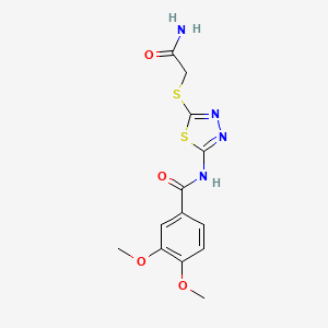 molecular formula C13H14N4O4S2 B2607341 N-[5-(2-amino-2-oxoethyl)sulfanyl-1,3,4-thiadiazol-2-yl]-3,4-dimethoxybenzamide CAS No. 820229-81-0