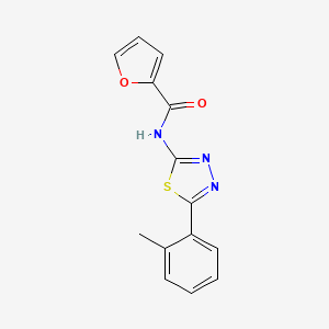 molecular formula C14H11N3O2S B2607472 N-(5-(o-tolyl)-1,3,4-thiadiazol-2-yl)furan-2-carboxamide CAS No. 392244-85-8