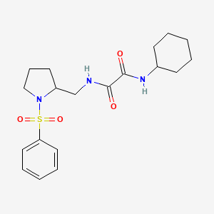 molecular formula C19H27N3O4S B2607702 N1-cyclohexyl-N2-((1-(phenylsulfonyl)pyrrolidin-2-yl)methyl)oxalamide CAS No. 896265-55-7