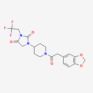 molecular formula C19H20F3N3O5 B2607946 1-{1-[2-(2H-1,3-benzodioxol-5-yl)acetyl]piperidin-4-yl}-3-(2,2,2-trifluoroethyl)imidazolidine-2,4-dione CAS No. 2097918-35-7
