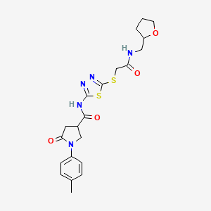 B2607977 1-(4-methylphenyl)-5-oxo-N-{5-[({[(oxolan-2-yl)methyl]carbamoyl}methyl)sulfanyl]-1,3,4-thiadiazol-2-yl}pyrrolidine-3-carboxamide CAS No. 872595-09-0