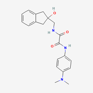 molecular formula C20H23N3O3 B2608015 N1-(4-(dimethylamino)phenyl)-N2-((2-hydroxy-2,3-dihydro-1H-inden-2-yl)methyl)oxalamide CAS No. 2034260-06-3