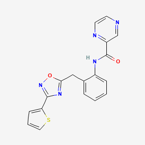 molecular formula C18H13N5O2S B2608222 N-(2-((3-(thiophen-2-yl)-1,2,4-oxadiazol-5-yl)methyl)phenyl)pyrazine-2-carboxamide CAS No. 1705952-02-8