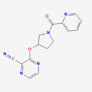 molecular formula C15H13N5O2 B2608675 3-((1-吡啶甲酰基吡咯烷-3-基)氧基)吡嗪-2-腈 CAS No. 2034281-76-8