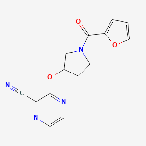 3-((1-(Furan-2-carbonyl)pyrrolidin-3-yl)oxy)pyrazine-2-carbonitrile