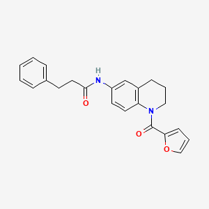 molecular formula C23H22N2O3 B2609976 N-[1-(2-furoyl)-1,2,3,4-tetrahydroquinolin-6-yl]-3-phenylpropanamide CAS No. 1005298-47-4