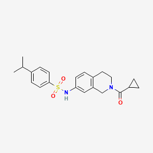 molecular formula C22H26N2O3S B2610634 N-(2-(cyclopropanecarbonyl)-1,2,3,4-tetrahydroisoquinolin-7-yl)-4-isopropylbenzenesulfonamide CAS No. 955638-44-5