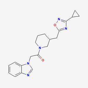 molecular formula C20H23N5O2 B2611016 2-(1H-benzo[d]imidazol-1-yl)-1-(3-((3-cyclopropyl-1,2,4-oxadiazol-5-yl)methyl)piperidin-1-yl)ethanone CAS No. 1705073-11-5