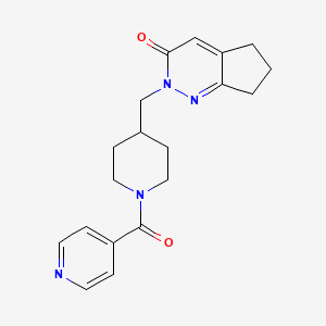 molecular formula C19H22N4O2 B2611047 2-[[1-(Pyridine-4-carbonyl)piperidin-4-yl]methyl]-6,7-dihydro-5H-cyclopenta[c]pyridazin-3-one CAS No. 2379987-30-9