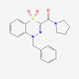 molecular formula C19H19N3O3S B2611063 1-benzyl-3-(1-pyrrolidinylcarbonyl)-4lambda~6~,1,2-benzothiadiazine-4,4(1H)-dione CAS No. 1251619-32-5