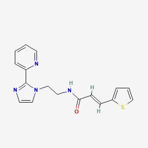 (E)-N-(2-(2-(pyridin-2-yl)-1H-imidazol-1-yl)ethyl)-3-(thiophen-2-yl)acrylamide