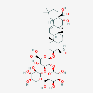 molecular formula C47H72O20 B2611160 (2S,3S,4S,5R,6R)-6-[[(3S,4S,6Ar,6bS,8R,8aR,12aS,14bR)-8a-carboxy-4-formyl-8-hydroxy-4,6a,6b,11,11,14b-hexamethyl-1,2,3,4a,5,6,7,8,9,10,12,12a,14,14a-tetradecahydropicen-3-yl]oxy]-3-hydroxy-5-[(2S,3R,4S,5R,6R)-3,4,5-trihydroxy-6-(hydroxymethyl)oxan-2-yl]oxy-4-[(2S,3R,4S,5R)-3,4,5-trihydroxyoxan-2-yl]oxyoxane-2-carboxylic acid CAS No. 97892-86-9