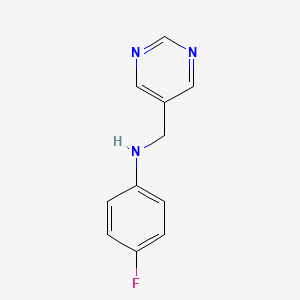 4-fluoro-N-(pyrimidin-5-ylmethyl)aniline