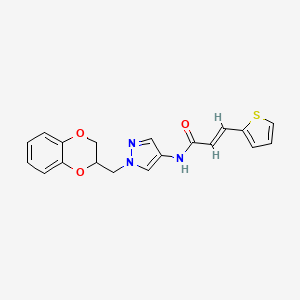 (E)-N-(1-((2,3-dihydrobenzo[b][1,4]dioxin-2-yl)methyl)-1H-pyrazol-4-yl)-3-(thiophen-2-yl)acrylamide