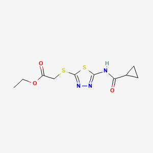 molecular formula C10H13N3O3S2 B2612682 乙酰-2-((5-(环丙烷甲酰胺)-1,3,4-噻二唑-2-基)硫代)乙酸酯 CAS No. 392317-89-4
