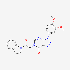 molecular formula C22H20N6O4 B2612698 3-(3,4-dimethoxyphenyl)-6-(2-(indolin-1-yl)-2-oxoethyl)-3H-[1,2,3]triazolo[4,5-d]pyrimidin-7(6H)-one CAS No. 893934-28-6