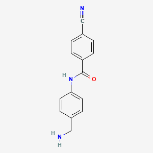 molecular formula C15H13N3O B2612997 N-[4-(Aminomethyl)phenyl]-4-cyanobenzamide CAS No. 1260835-40-2