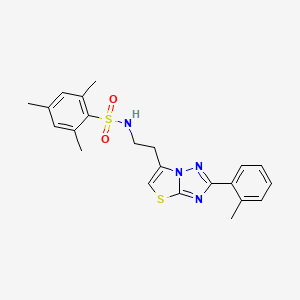 molecular formula C22H24N4O2S2 B2613125 2,4,6-trimethyl-N-(2-(2-(o-tolyl)thiazolo[3,2-b][1,2,4]triazol-6-yl)ethyl)benzenesulfonamide CAS No. 946274-04-0