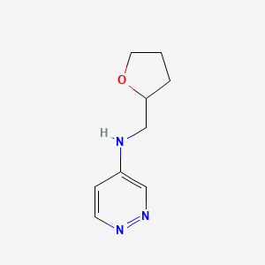 N-[(Oxolan-2-yl)methyl]pyridazin-4-amine